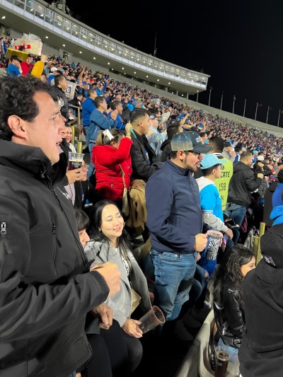 Passionate crowd at Estadio Ciudad de los Deportes showing authentic CDMX experiences for football fans during a match.
