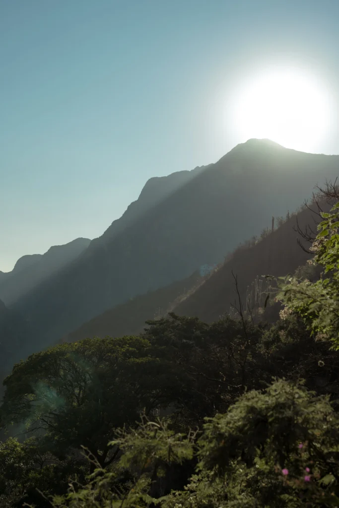 A breathtaking sunrise silhouette of the rugged mountains surrounding the Tolantongo hot springs in Hidalgo, Mexico